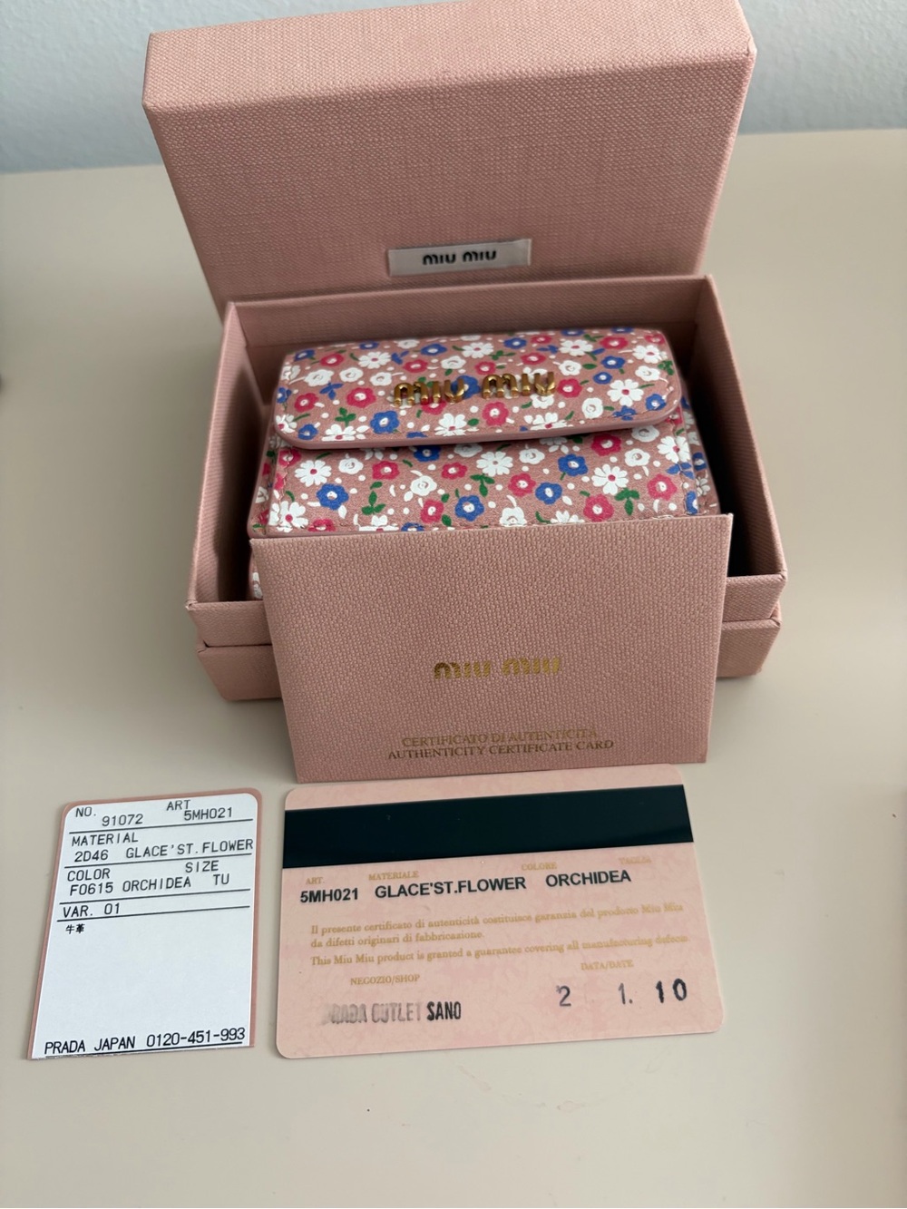 Miu Miu Pink Floral trifold wallet with COA tissue paper and gift box.